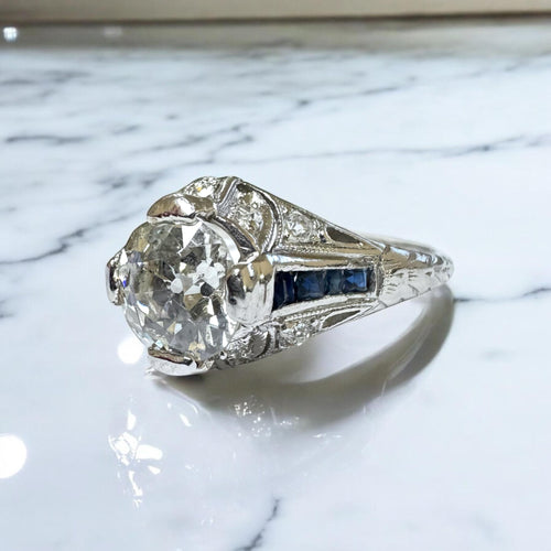 Antique Art Deco 1.25 Carat Diamond and Sapphire Platinum Engagement Ring