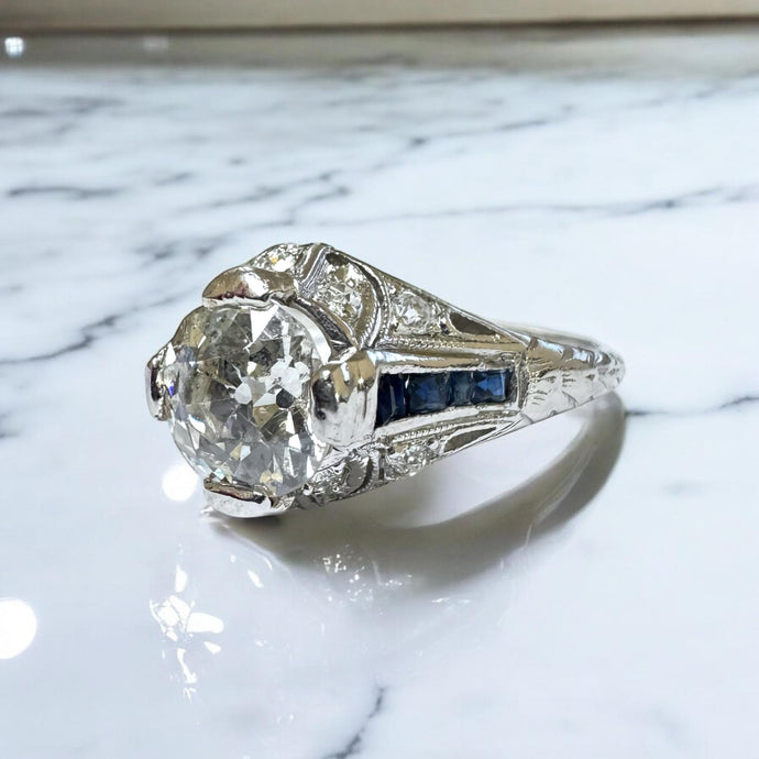 Antique Art Deco 1.25 Carat Diamond and Sapphire Platinum Engagement Ring