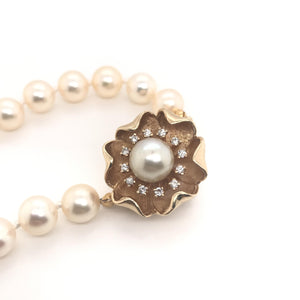 VINTAGE MID CENTURY 7.5 MM PEARL NECKLACE WITH FLORAL DIAMOND CLASP