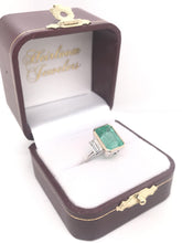 CONTEMPORARY 4.99 CARAT COLOMBIAN EMERALD AND DIAMOND RING
