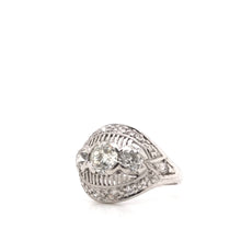 MID CENTURY 1.25 DTW DIAMOND AND PLATINUM RING