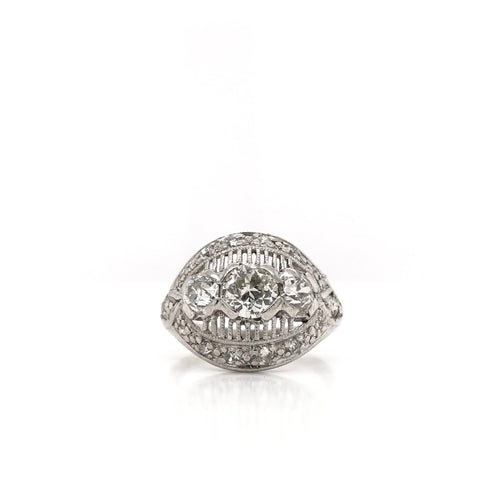 MID CENTURY 1.25 DTW DIAMOND AND PLATINUM RING