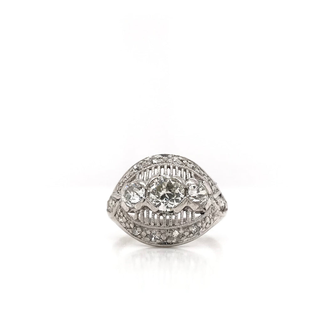 MID CENTURY 1.25 DTW DIAMOND AND PLATINUM RING
