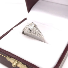 EDWARDIAN 0.71 CARAT DIAMOND AND PLATINUM SOLITAIRE RING