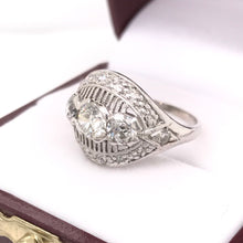 MID CENTURY 1.25 DTW DIAMOND AND PLATINUM RING