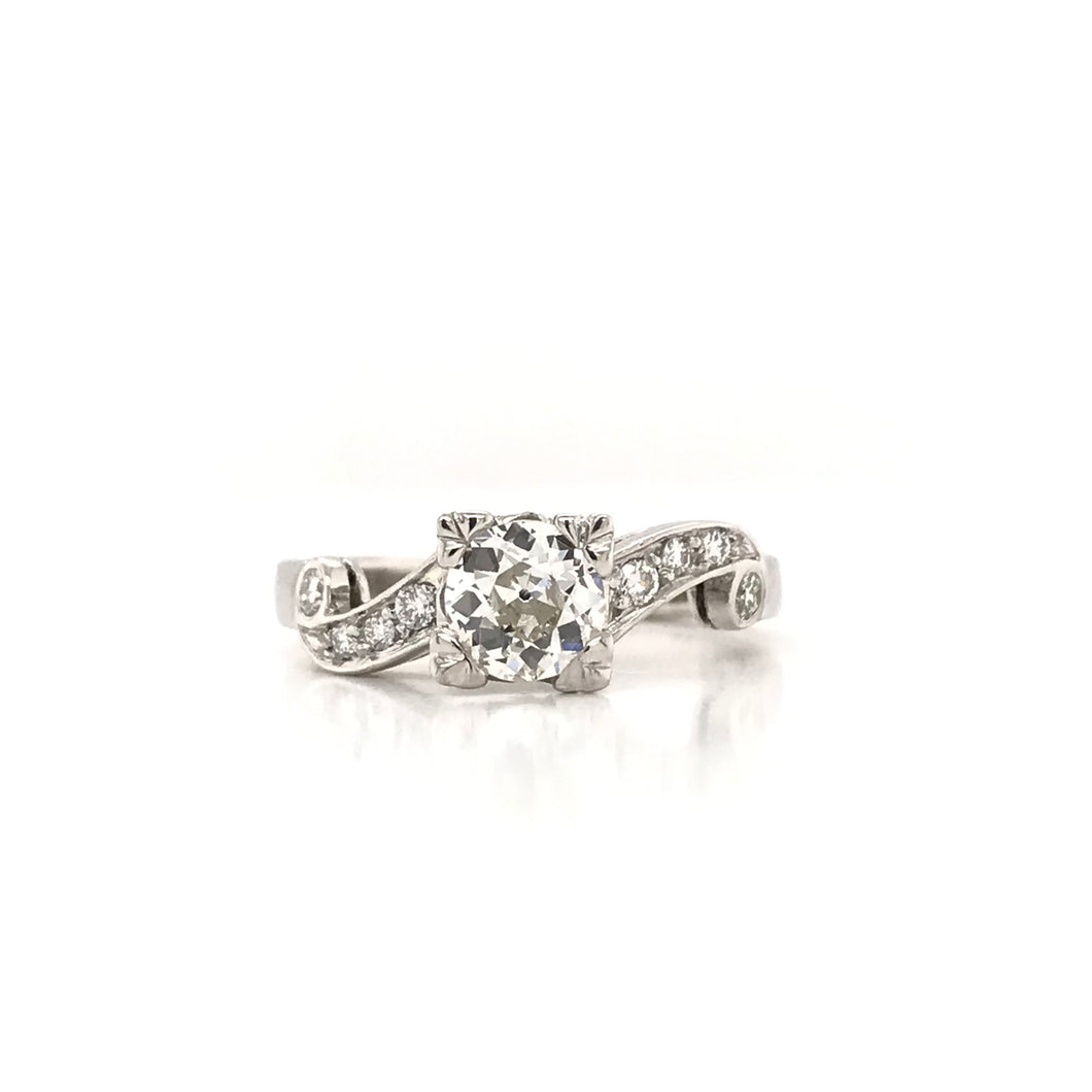 0.74 CARAT MID CENTURY DIAMOND PLATINUM RING