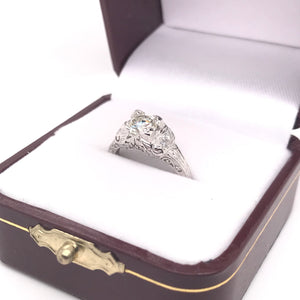 EDWARDIAN 0.74 CARAT DIAMOND AND PLATINUM FILIGREE RING