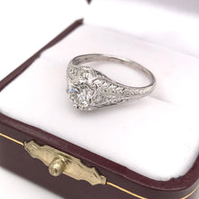 EDWARDIAN 0.71 CARAT DIAMOND AND PLATINUM SOLITAIRE RING