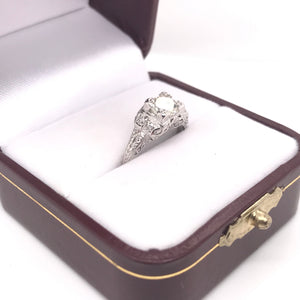 EDWARDIAN 0.74 CARAT DIAMOND AND PLATINUM FILIGREE RING