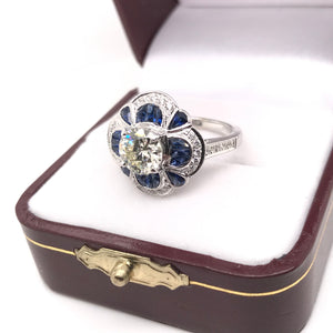 ANTIQUE INSPIRED 1.25 CARAT DIAMOND AND SAPPHIRE RING