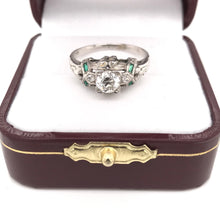 0.50 CARAT ART DECO DIAMOND AND EMERALD RING