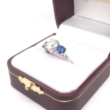 CONTEMPORARY STYLE 1.42 CARAT DIAMOND AND SAPPHIRE TRINITY RING