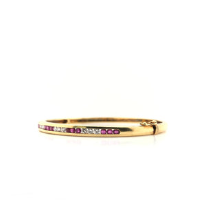 VINTAGE CHANNEL SET RUBY AND DIAMOND GOLD BANGLE
