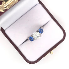 CONTEMPORARY STYLE 1.42 CARAT DIAMOND AND SAPPHIRE TRINITY RING