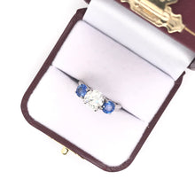 CONTEMPORARY STYLE 1.42 CARAT DIAMOND AND SAPPHIRE TRINITY RING