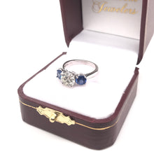 CONTEMPORARY STYLE 1.42 CARAT DIAMOND AND SAPPHIRE TRINITY RING