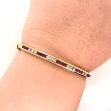 VINTAGE CHANNEL SET RUBY AND DIAMOND GOLD BANGLE