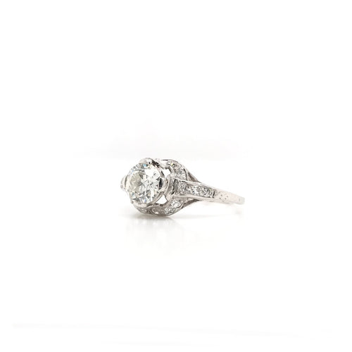 ANTIQUE EDWARDIAN 0.90 CARAT DIAMOND AND PLATINUM FILIGREE RING