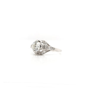 ANTIQUE EDWARDIAN 0.90 CARAT DIAMOND AND PLATINUM FILIGREE RING