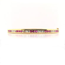 VINTAGE CHANNEL SET RUBY AND DIAMOND GOLD BANGLE