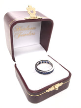 BLUE SAPPHIRE ETERNITY BAND
