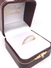 CONTEMPORARY 0.47 CARAT DTW DIAMOND AND GOLD BAND